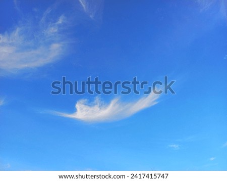 White clouds with a beautiful blue cloud background