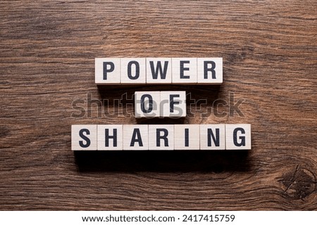 Power of sharing - word concept on building blocks, text