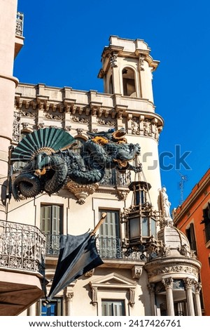 Chinese dragon on 19th century House of Umbrellas (Casa Bruno Cuadros) building on La Rambla in Barcelona, Catalonia, Spain, Europe