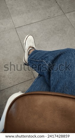 relaxing in the kyrsi with white shoes