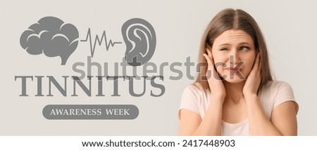 Banner for Tinnitus Awareness Week with young woman having hearing disorder Royalty-Free Stock Photo #2417448903