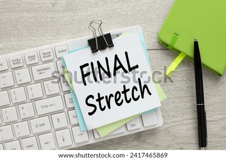 Final Stretch text on note paper on white keyboard Royalty-Free Stock Photo #2417465869