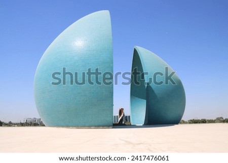 iraqi martyr monument with blue sky Royalty-Free Stock Photo #2417476061