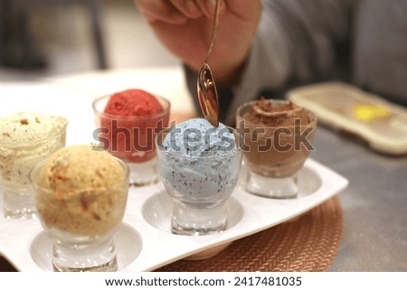 close up colorful icecream shot scoop on salver tray Royalty-Free Stock Photo #2417481035