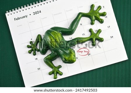 Happy Leap Day on 29 February with Jumping Frog Royalty-Free Stock Photo #2417492503