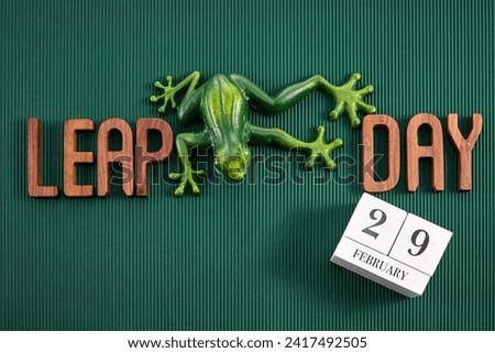 Happy Leap Day on 29 February with Jumping Frog Royalty-Free Stock Photo #2417492505