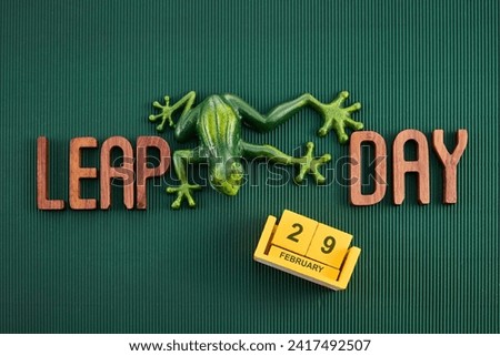 Happy Leap Day on 29 February with Jumping Frog Royalty-Free Stock Photo #2417492507