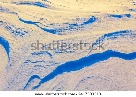 Waves drawn by wind in snow in Bremerhaven Bremen Germany.