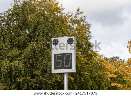Speed control board on highway shows your car speed. High quality photo