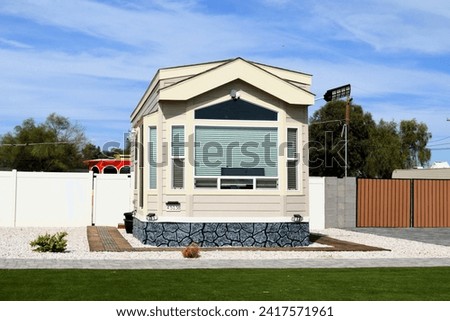 a new tiny home recently completed on small city lot Royalty-Free Stock Photo #2417571961