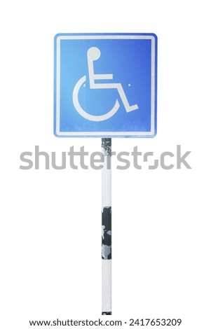 Blue handicapped sign parking spot. Disabled parking permit sign on pole isolated on white background. Object with clipping path