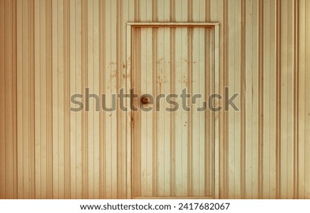 Old weathered and rusty closed steel door for steel metal store door background and texture.