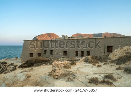 Castle or battery of San Ramón in Rodalquilar, Almería, Spain. View of the walls of the coastal defense structure built in 1764. Royalty-Free Stock Photo #2417695857