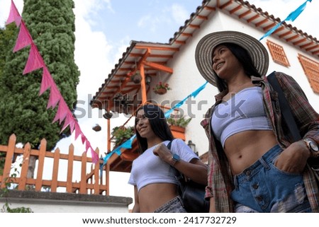 photo of two latin women on a trip