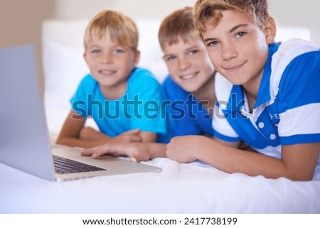 Children, home and portrait on laptop in bedroom, smile and excited for online games in house. Young kids, happy face and streaming cartoons on bed for bonding together, siblings and relax on weekend