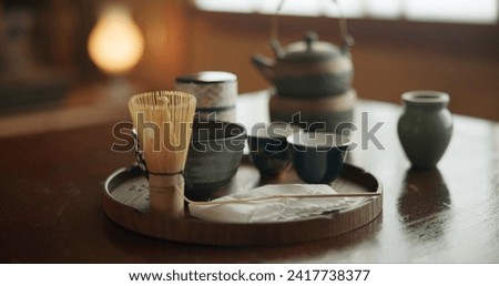 Tea cup, ceremony and Japanese tradition with matcha and green brew for healing and detox practise. Temae, pot and cut for an indigenous, nutrition and wellness hot drink in a home with healthy herbs