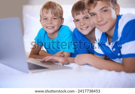 Brothers, home and portrait on laptop in bedroom, above and excited for online games in house. Young children, happy face and streaming cartoons on bed for bonding together, love and relax on weekend