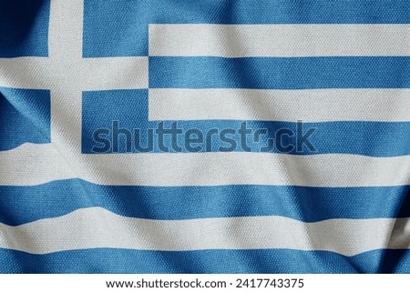 National flag of Greece flutters in the wind. Wavy Israeli Flag. Close-up front view. White and blue