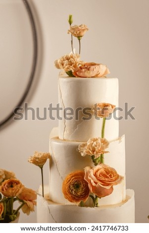 Elegant style wedding cake decorated with flowers. Wedding sweets.