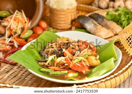 Sticky rice, papaya salad, Som Tam , som tum, thai food, isan food,Thai isan kitchen  , som tum lao,  Royalty-Free Stock Photo #2417753539