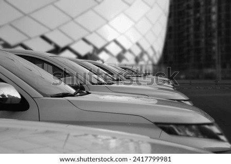 A lot of same white SUV cars in a rows. new modern or Used car sales. long perspective, Line of motor auto engine. Cars For Sale Stock Lot Row. Car Dealer Inventory. cars dealership place automaker 
 Royalty-Free Stock Photo #2417799981