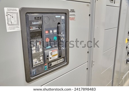 Industrial Circuit Breaker Controls and Safety Labels - Close-Up View Royalty-Free Stock Photo #2417898483