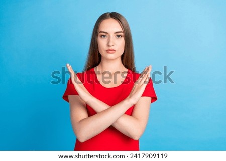Photo of confident serious woman wear trendy clothes crossed arms demonstrate refusal isolated on blue color background