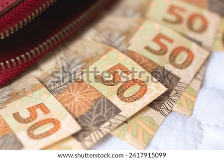 Brazilian Real Banknotes in close-up photo. Brazilian economy.