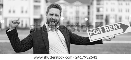 renter adviser man hold board for rent sign with copy space. rent house with renter adviser man