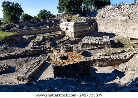 Ruins of Troy Ancient City in Canakkale, Turkey. Troy is best known as the setting for the Greek myth of the Trojan War. Royalty-Free Stock Photo #2417933899