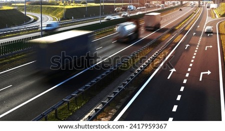 Four lane controlled-access highway in Poland. Royalty-Free Stock Photo #2417959367