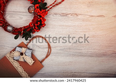 Christmas background on wooden table and copy space, shopping bag