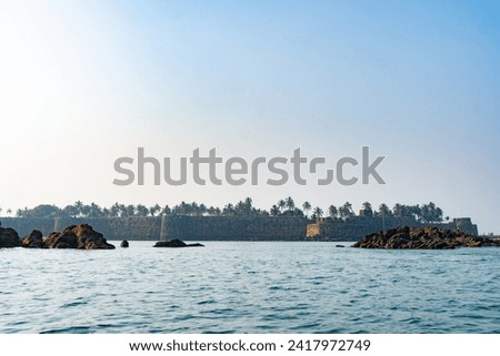 view of Sindhudurg fort from ocean and blue sky