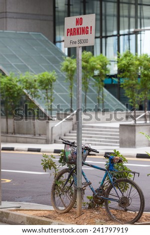 Heavy fine in Singapore/Caution signboard/he forbidding signs Singapore