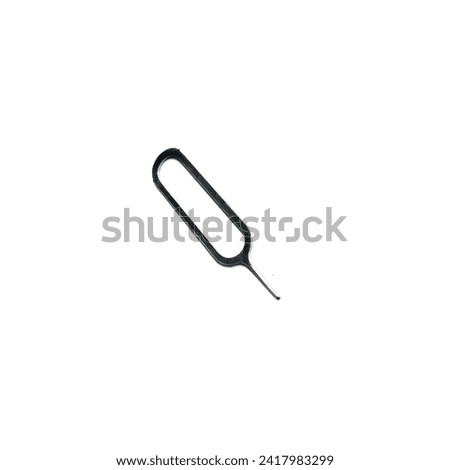 Strange silver sim eject pin made of iron isolated on white background Royalty-Free Stock Photo #2417983299