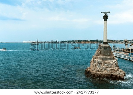 Sevastopol's memorial to sunken ships. A solemn tribute to maritime history, standing against the backdrop of the Black Sea's historic waters Royalty-Free Stock Photo #2417993177