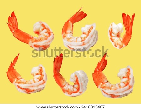 Red boiled shrimp or tiger prawn isolated with clipping path, no shadow on yellow background, cooked seafood, cooking ingredient