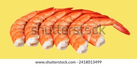 Red boiled shrimp or tiger prawn isolated with clipping path, no shadow on yellow background, cooked seafood, cooking ingredient