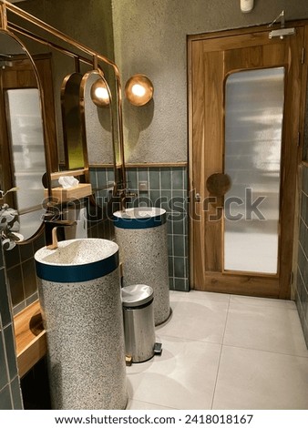 Modern and unique toilet interior in restaurant