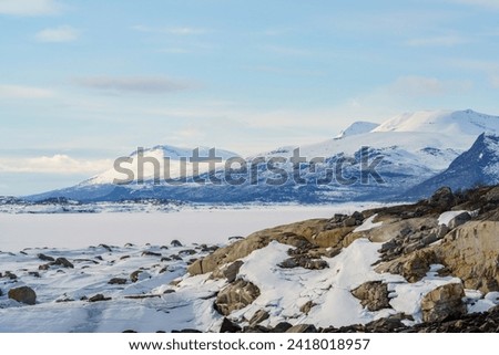 Spring time in stora sjöfallet national park with sunny weather and snowy mountains, Gällivare county, Swedish Lapland, Sweden Royalty-Free Stock Photo #2418018957
