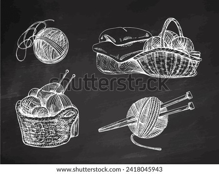 Hand-drawn sketch of basket with balls of yarn, wool, knitted goods on chalkboard background. Knitwear, handmade, knitting equipment concept in vintage doodle style. Engraving style.