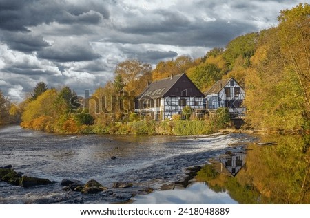 historic grinding House by name Wipperkotten in Wipperaue at Wupper River,Bergisches Land,North Rhine Westphalia,Germany Royalty-Free Stock Photo #2418048889