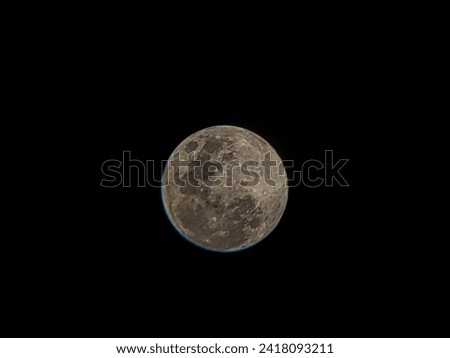 the moon , Super full moon with dark background. moon selective  focus on the subject ,sky , Horizontal Photography