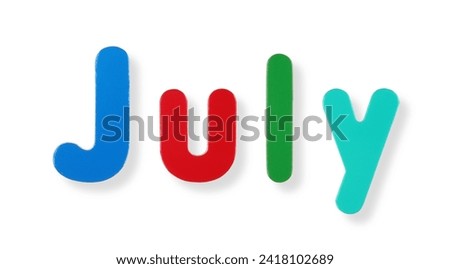 July word in coloured magnetic letters