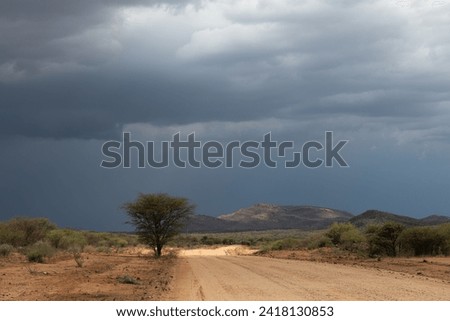 Rain clouds over the landscape near Omaruru, Namibia Kopie Royalty-Free Stock Photo #2418130853
