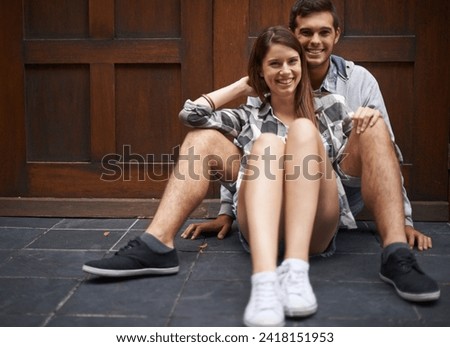 Portrait, floor and relax couple smile, happy and enjoy weekend together for comfort, bonding and romantic connection. Ground, love and gen z people care for relationship, happiness and devotion Royalty-Free Stock Photo #2418151953