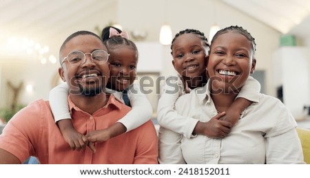 Black family, face and happy with parents and children at home, love and bonding with hug and spending time together. Man, woman and girl kids, happiness and portrait and people smile in living room