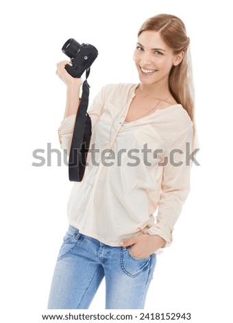 Portrait, creative photographer and happy woman with camera in studio isolated on a white background. Confident person, paparazzi and technology for hobby, taking pictures or professional photoshoot
