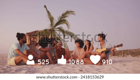Image of people, thumbs up and heart icons with numbers over friends having party on beach. digital interface, social media and global technology concept digitally generated image.