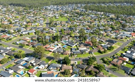 Drone aerial photograph of houses and parklands in the suburb of Werrington County in the greater Sydney region on New South Wales in Australia Royalty-Free Stock Photo #2418158967